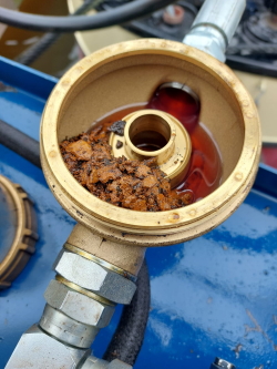 Solids trapped when fuel polishing